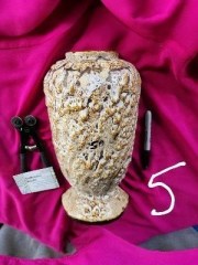 Halved ceramic vase labeled SA with mottled brown and white glaze, shown on magenta fabric with tools – The Mosaic Mall